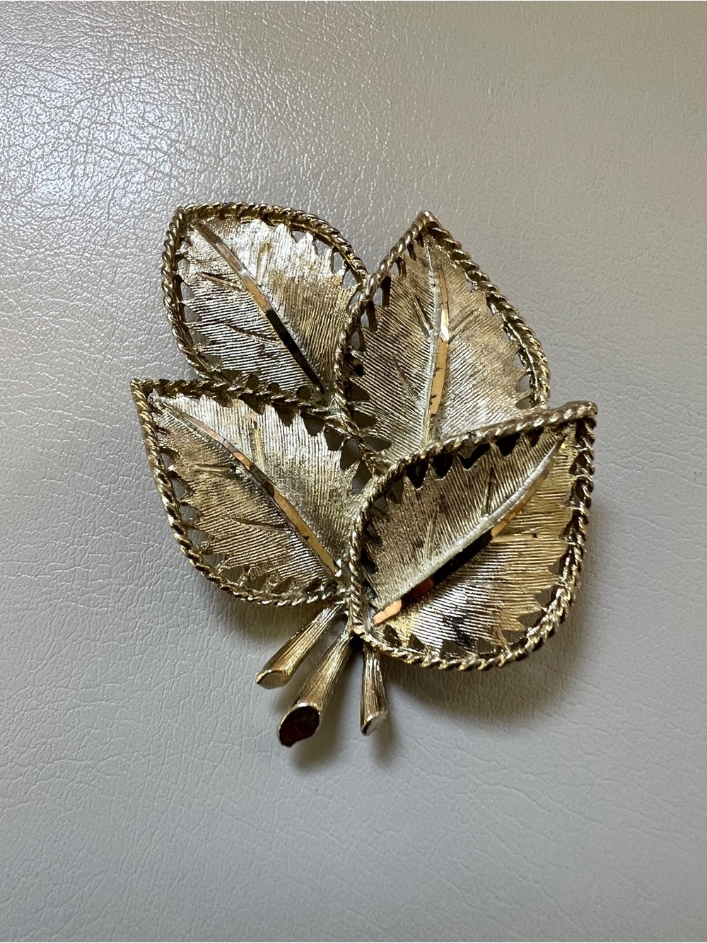 Vintage Signed BSK Gold Tone Four Leaf Textured Diamond Cut BROOCH